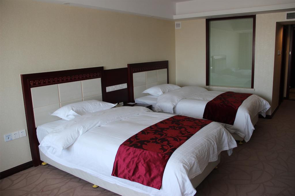 Dalian Southern Airline Pearl Hotel Chambre photo